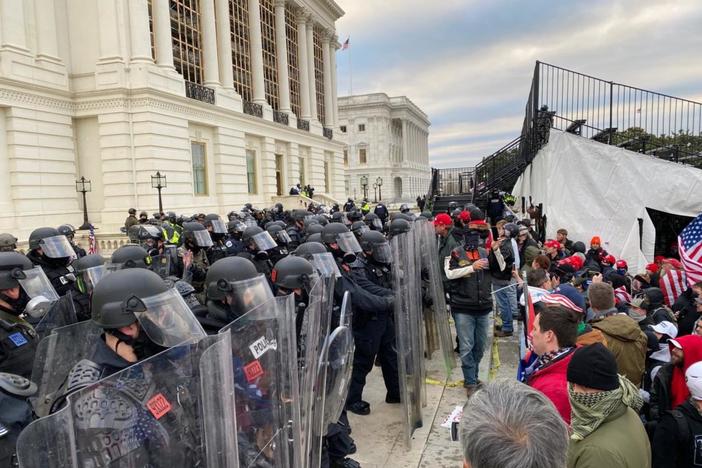 Security forces block the entrance after the U.S. President Donald Trump's supporters breached the US Capitol security in Washington D.C., United States on January 06, 2021. Pro-Trump rioters stormed the US Capitol as lawmakers were set to sign off Wednesday on President-elect Joe Biden's electoral victory in what was supposed to be a routine process headed to Inauguration Day. Photo by Tayfun Coskun/Anadolu Agency via Getty Images