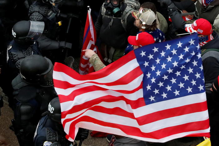 Pro-Trump protesters face off with police at the U.S. Capitol, during a rally to contest the certification of the 2020 U.S. presidential election results by the U.S. Congress, in Washington, U.S, January 6, 2021. Photo by Shannon Stapleton