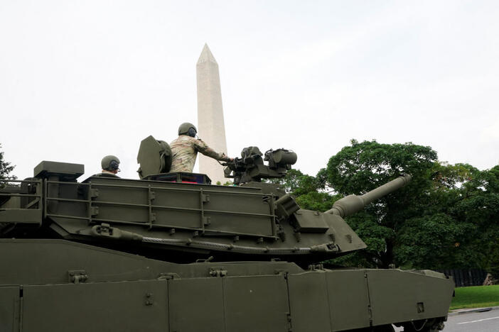 Members of the U.S Army sit atop M1A2 Abrams tank near the Washington Monument, ahead of the upcoming Army's 250th anniversary celebration parade, in Washington, D.C., June 13, 2025. Photo by Nathan Howard/Reuters