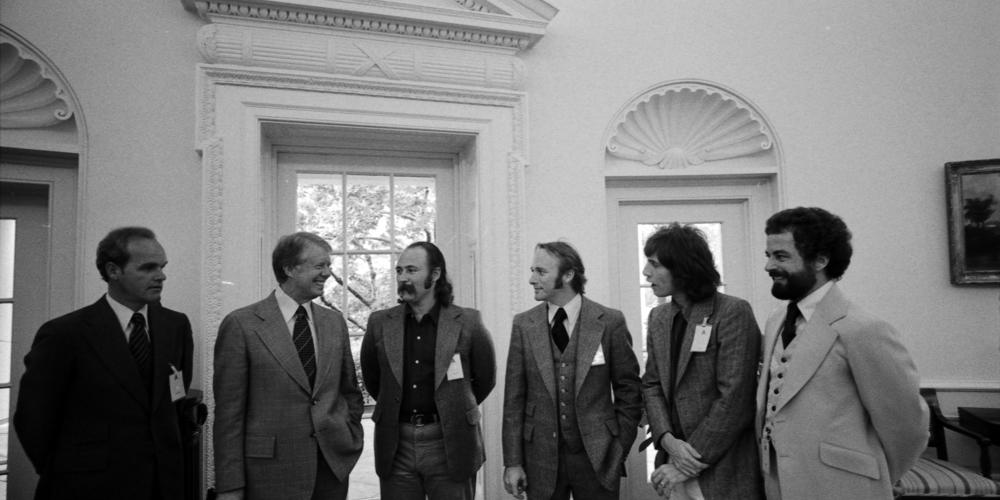President Jimmy Carter with Crosby, Stills and Nash, Bono, and Nile Rodgers in the White Hoouse.