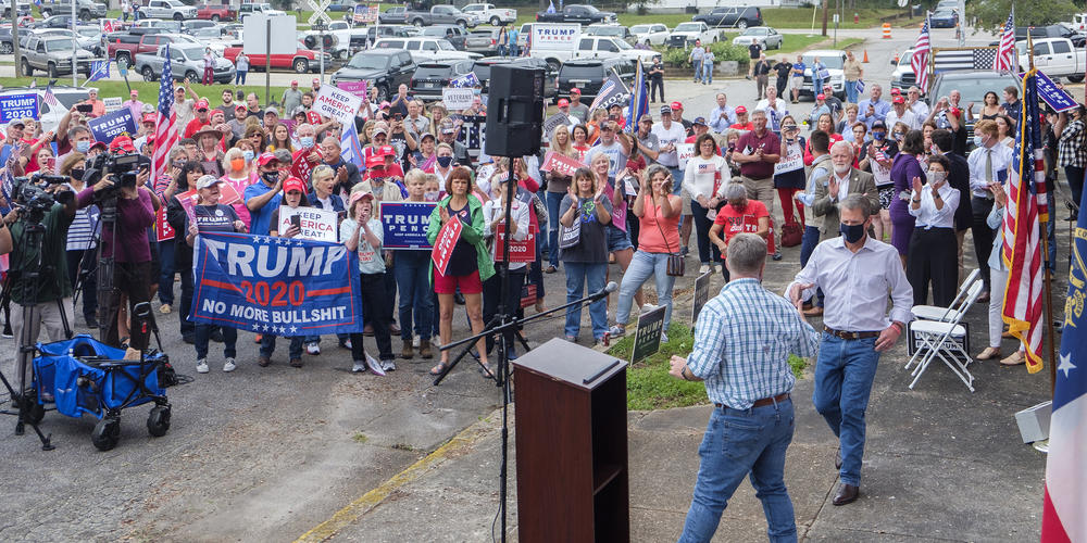 Gov. Brian Kemp approaches the podium at a pro-Trump rally in Manchester, Georgia, ahead of Joe Biden's later visit to nearby Warm Springs Oct. 27, 2020.