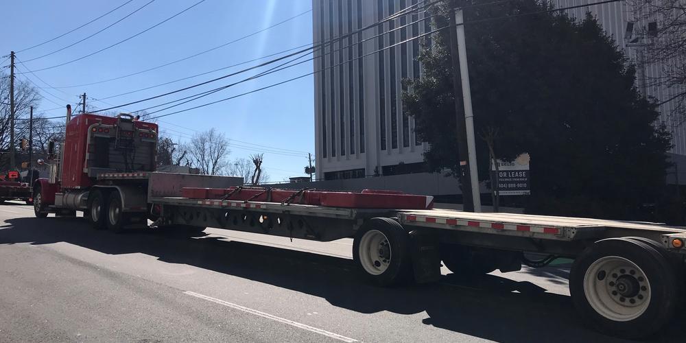 Crews work to remove leaning and "possibly unstable" crane in midtown Atlanta on Friday, Feb. 19, 2021