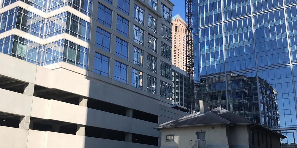 Crews work to remove leaning and "possibly unstable" crane in midtown Atlanta on Friday, Feb. 19, 2021