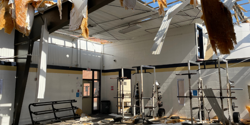 Damage done to Newnan High School's weight room after devastating tornado.