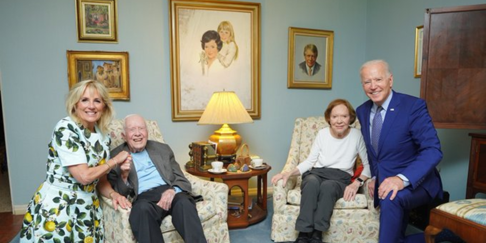 Former President Jimmy Carter and former first lady Rosalynn Carter pose for a photo during President Joe Biden's and first lady Jill Biden's visit with the Carters in Plains, Ga., April 29, 2021.