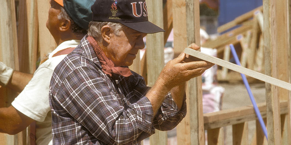 Beginning in 1984, Jimmy and Rosalynn Carter volunteered one week a year to build homes for Habitat for Humanity. Jimmy Carter is pictured here working in the Watts/Willowbrook community of Los Angeles in 1995.