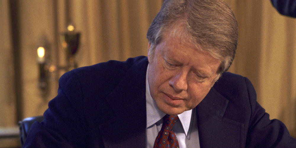 During the first week of his presidency, Jimmy Carter signs request to Congress to pass Emergency Natural Gas Act. January 26, 1977.