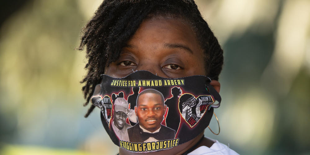 Ahmuad Arbery’s aunt Theawanza Brooks stands for a portrait outside of the Glynn County Courthouse on Oct. 16.