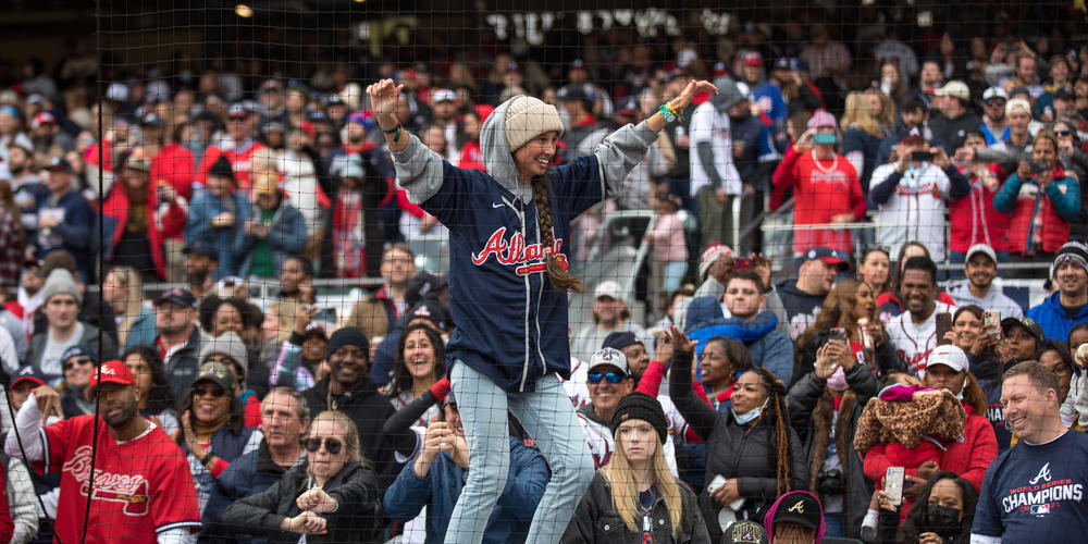 Fans dance on the dugouts during the Braves’ World Series victory celebration at Truist Park on Nov. 5.