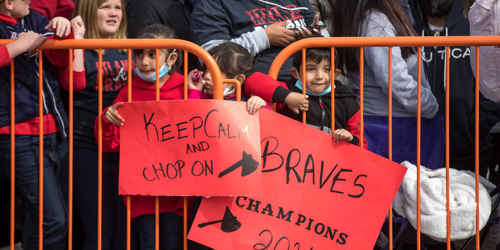 Young Braves fans anxiously await the teams arrival to The Battery outside Truist Park in Cobb County for the second leg of the player’s parade celebrating their World Series win on Nov. 5.