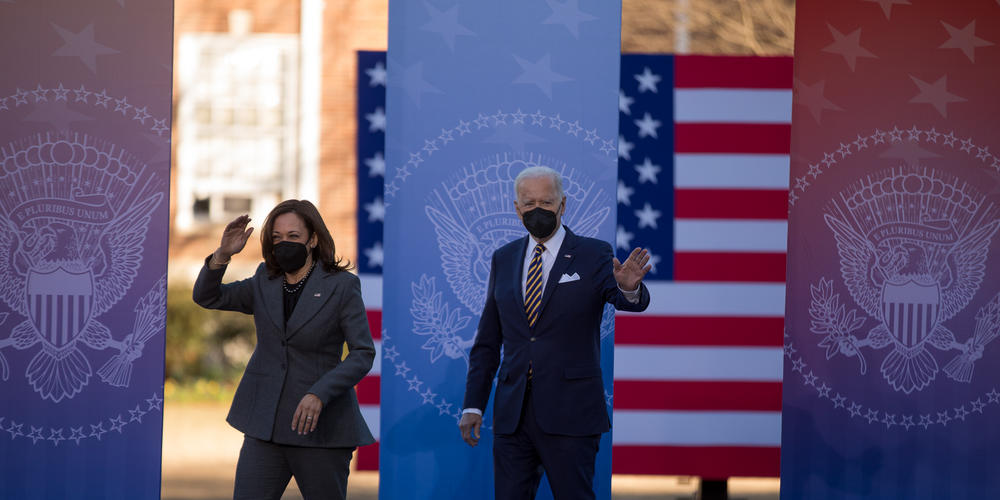 President Joe Biden and Vice President Kamala Harris make their way onstage