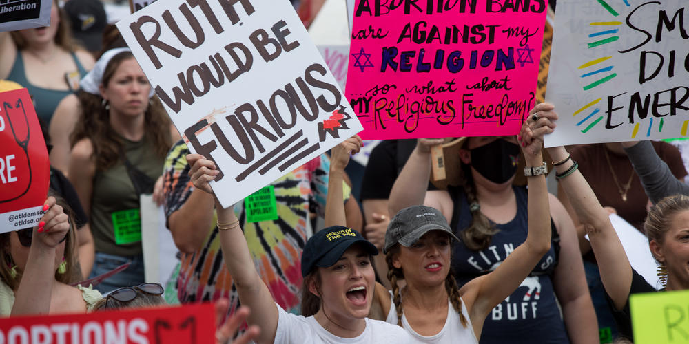 Protesters rally outside of the Georgia State Capitol in Atlanta on June 24 in response to the Supreme Court’s decision to overturn the 1973 landmark decision in Roe v Wade. Georgia’s six-week abortion ban that has been held up by a district court will likely go into effect due to the ruling.