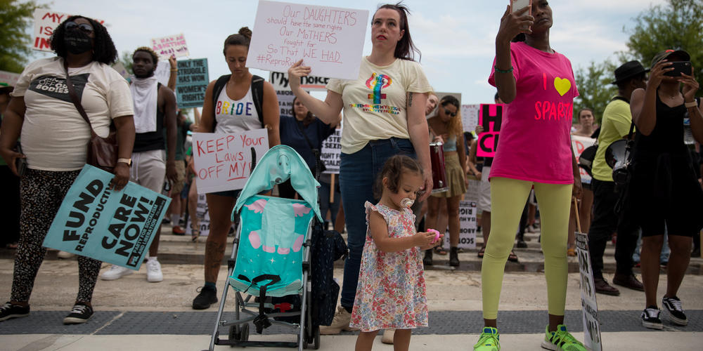 Women gather outside of the Georgia Capitol in Atlanta on June 24 to protest the Supreme Court’s decision to dissolve federal abortion protections. In 2019, state lawmakers passed a law that would ban abortions at around six weeks of pregnancy.