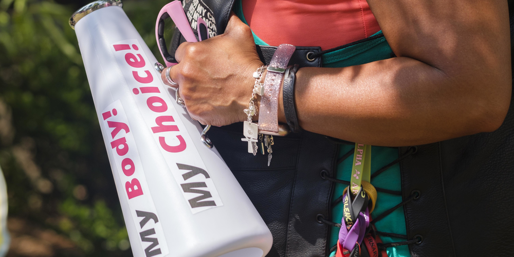 Hundreds attended a rally Sunday in Macon in protest of the overturning of Roe v. Wade. After a brief march, attendees, one after the other, shared their stories of abortion, access and choice.