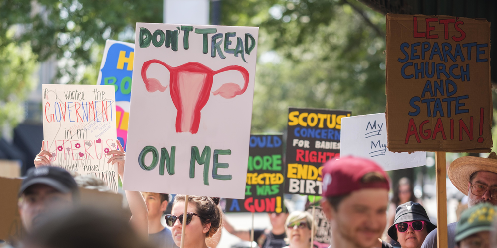 Hundreds attended a rally Sunday in Macon in protest of the overturning of Roe v. Wade. After a brief march, attendees, one after the other, shared their stories of abortion, access and choice.