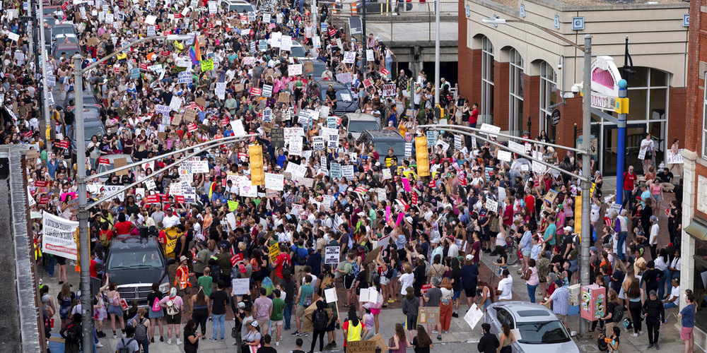 People gather in front of the Georgia State Capitol in Atlanta on Friday, June 24, 2022, to protest to protest the Supreme Court's decision to overturn Roe v. Wade.