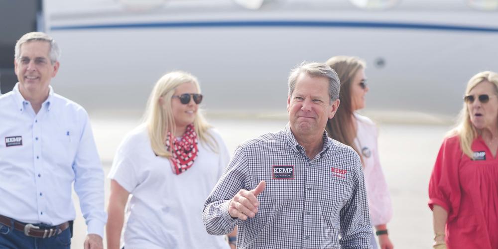 Georgia Governor Brian Kemp is backed by his wife and much of the down ballot Republican ticket during a campaign stop in Macon on the day before Election Day.