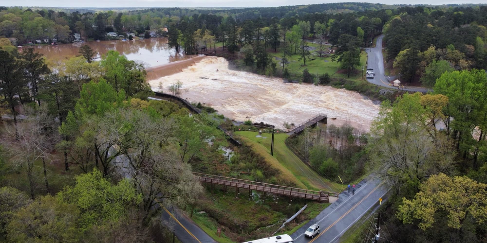 An aerial view shows water rushing through High Falls State Park in Monroe County after severe storms brought rain and flooding on March 27, 2023