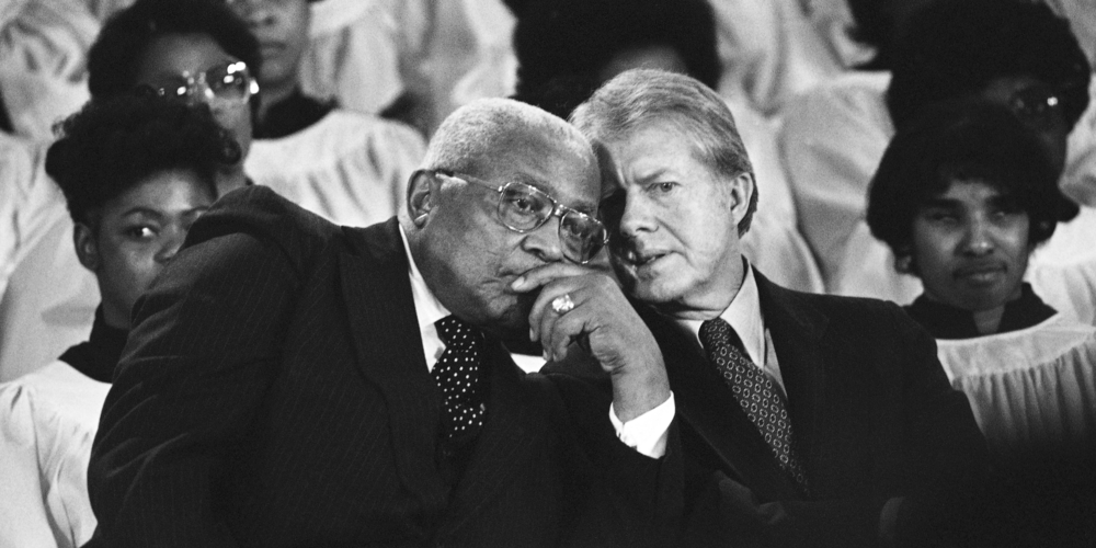 The Rev. Martin Luther King Sr. and President Jimmy Carter, right, confer during a ceremony in Atlanta on Jan. 14, 1979, to present the Dr. Martin Luther King Jr. Non-Violent Peace Prize to Carter. 