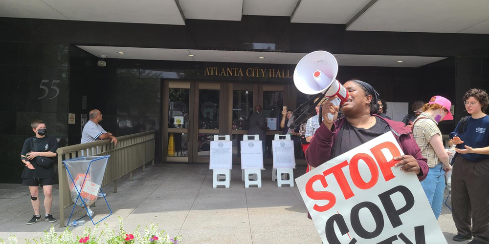 Protestors gathered, lined up and created banners in front of Atlanta City Hall on June 5, 2023 as Atlanta City Council holds a period of public comment and votes on the proposed police training facility.