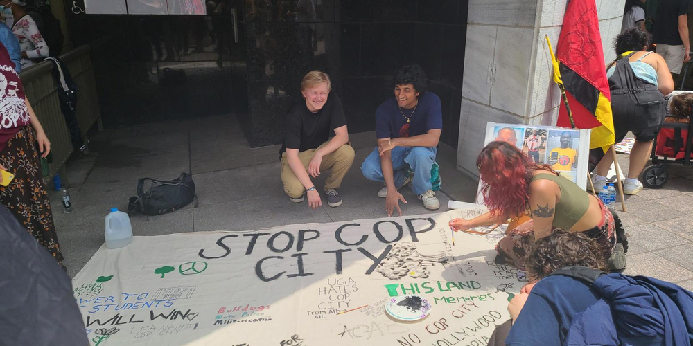 Protesters gathered, lined up and created banners in front of Atlanta City Hall on June 5, 2023 as Atlanta City Council holds a period of public comment and votes on funding for the proposed police training facility.