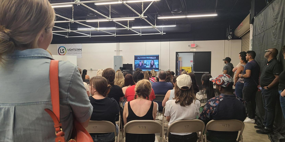 SAG-AFTRA rally attendees gather in one of four overflow areas to listen to local and national leaders speak about the strike. 
