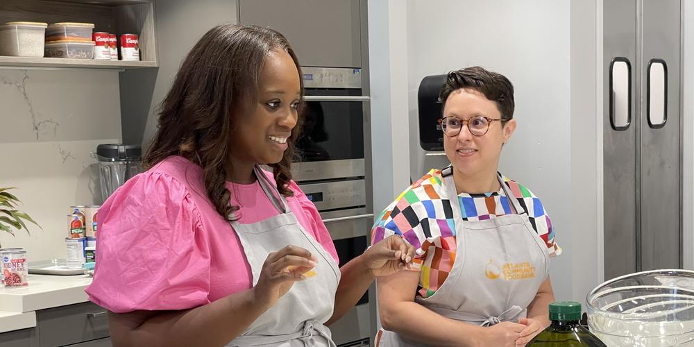 Leanna Pierre talks as she preps ingredients.