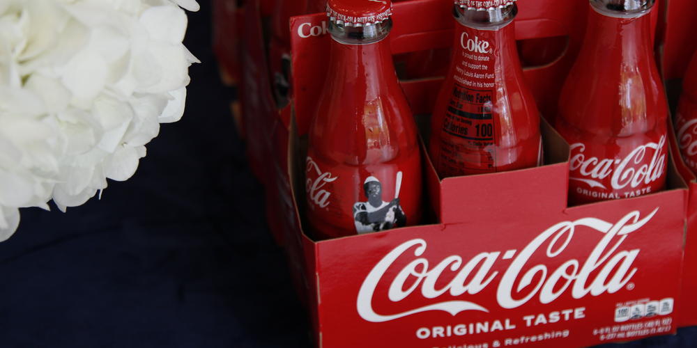 Commemorative Coca-Cola bottles presented to guests. The company is a donor to the Henry Louis Aaron Fund.