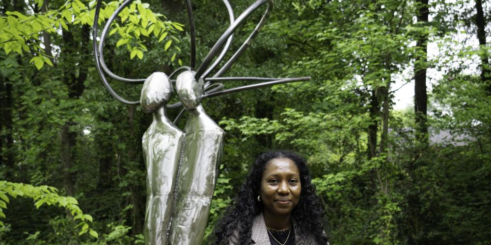 Artist Taiye Idahor stands in front of her work “Ivbieva” in 2024. Photo by Dr. Arshley Emile, Courtesy of Atlanta BeltLine