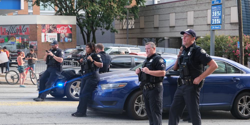 Police monitor a pro-Palestine protest in Midtown on June 27, 2024.