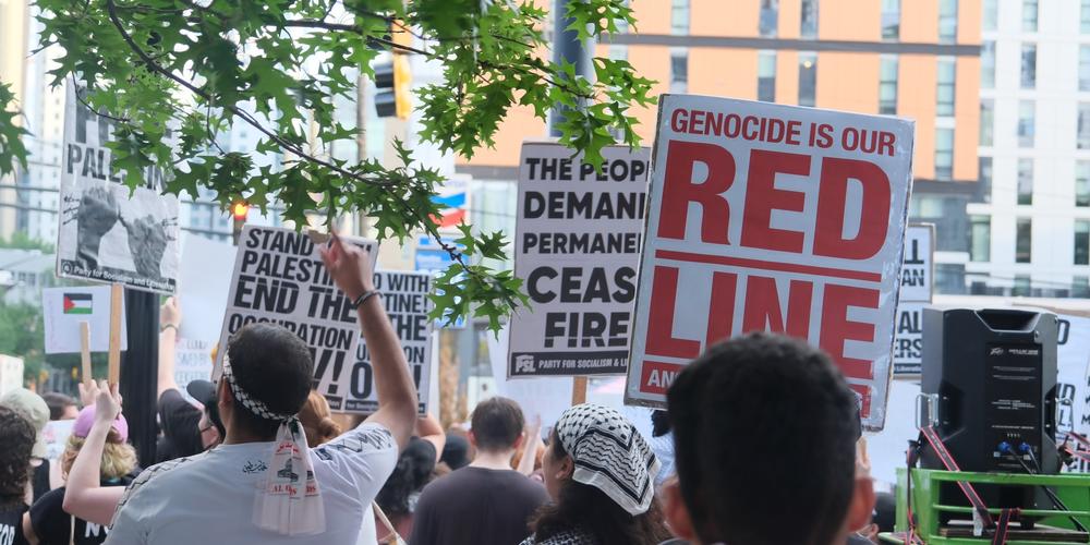 Protestors in support of Palestine rally in Midtown Atlanta on June 27, 2024.
