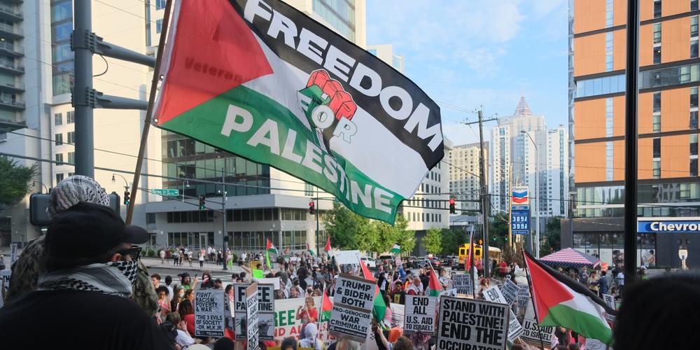 Protestors in support of Palestine rally in Midtown Atlanta on June 27, 2024.