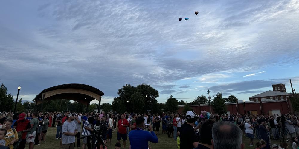 Apalachee High School students and people from the broader Barrow County community gathered for a prayer vigil in a city park after the shooting deaths of four at the school Wednesday. Chase McGee/GPB News