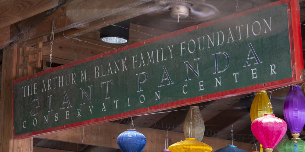 A sign reads, "The Arthur M. Blank Family Foundation Giant Panda Conservation Center."