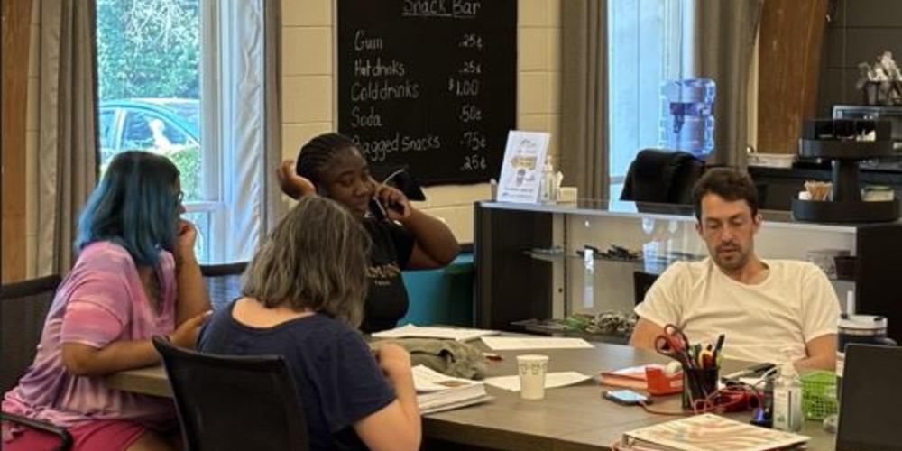 clubhouse members at a table