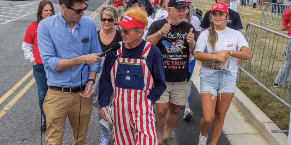 Journalists worked the line to get into the Macon Trump rally for insights into the thinking of Trump voters.