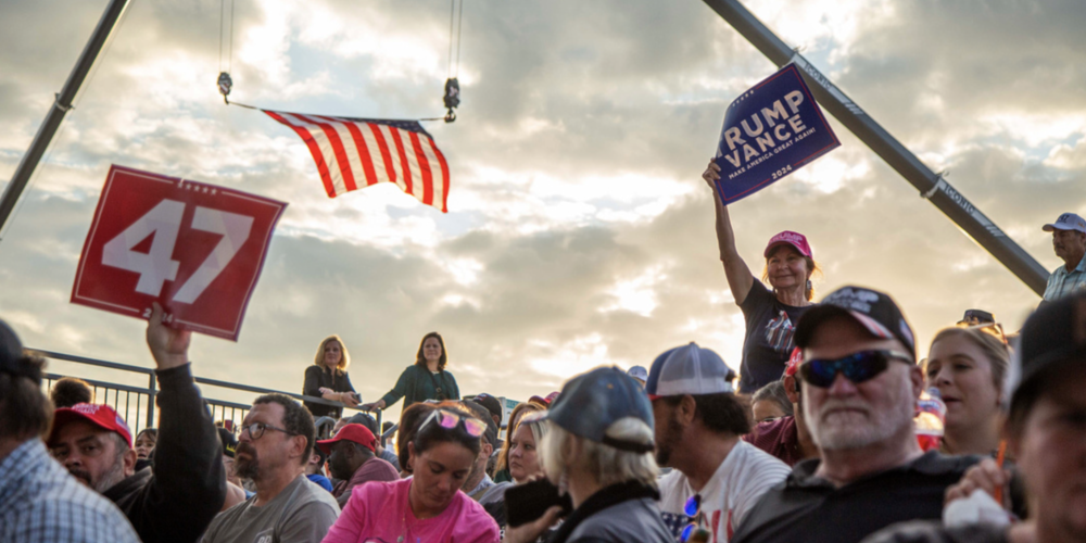 Trump supporters near sundown at his Macon rally Sunday.