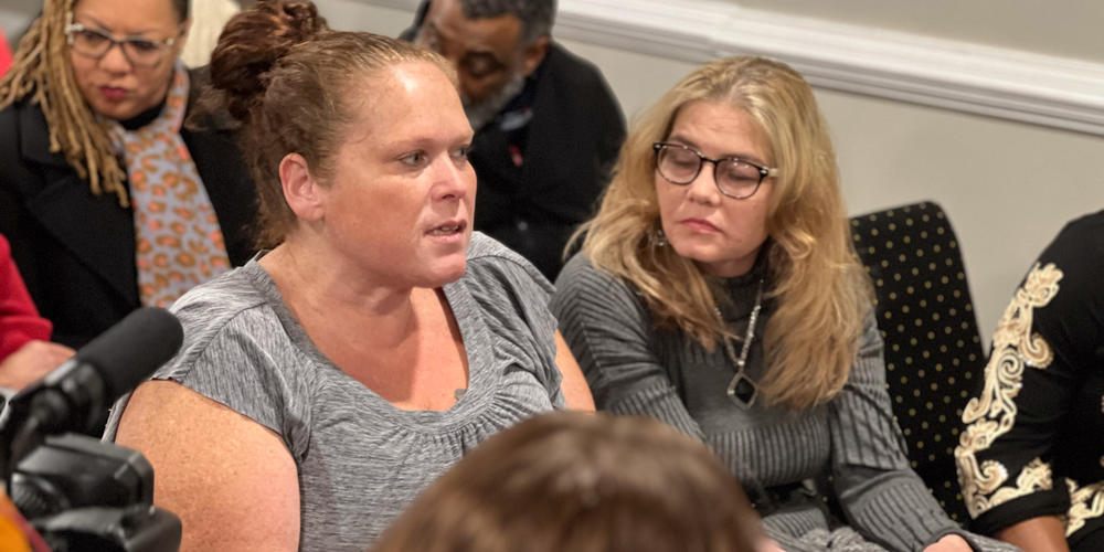 Jami Wallace, president of the Unity Council for the East Palestine Train Derailment, sits with fellow resident Tamara Lynn Freeze.