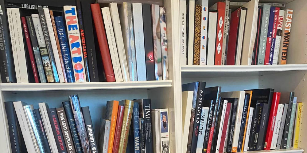 A bookshelf in Elton John's Atlanta residence shows a selection from approximately 2000 photography titles donated to the Emory University libraries by the musician in 2024