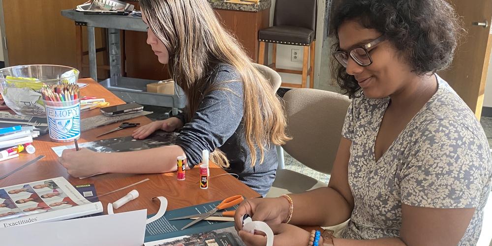 On Oct. 6, 2024, students and faculty participate in a collage and zine-making exercise utilizing the dust jackets of books donated by Sir Elton John. 
