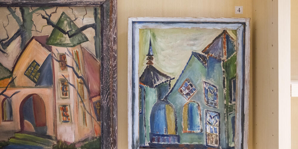 Two paintings of the same church in the exhibit. Curators believe it may be First Presbyterian Church in downtown Milledgeville.