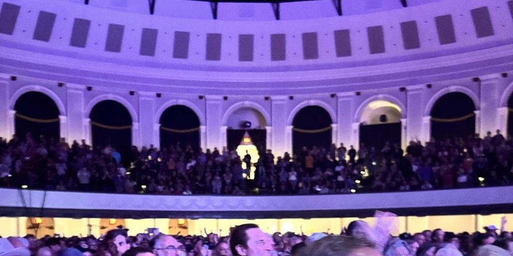 The capacity crowd at Macon City Auditorium enjoys the show under a classical dome inspired by Roman and Greek architecture. 