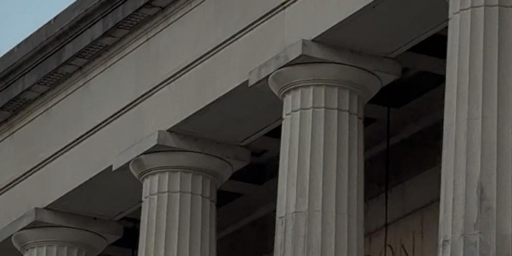 The Doric columns in front of the Macon City Auditorium are captured just before sundown on Feb. 28, 2025.