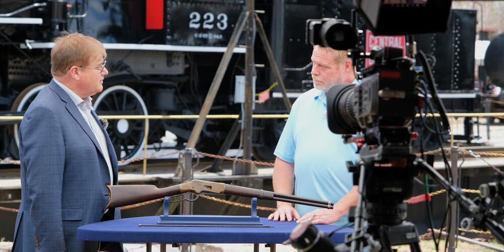 Antique firearms expert Paul Carella appraises an 1869 lever-action rifle brought by Mark from South Carolina. Carella assessed the rifle with an auction value between $6,000 and $8,000. Despite the appraisal far exceeding Mark's expectations, "It will never go out of the family," he said of the heirloom, which was passed down from his grandfather.