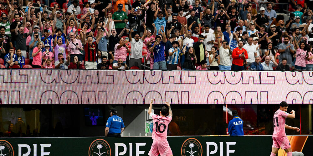 Inter Miami CF star Lionel Messi waves to the crowd in Atlanta's Mercedes-Benz Stadium on June 19, 2025 after the team  prevailed over Porto in a FIFA Club World Club match.