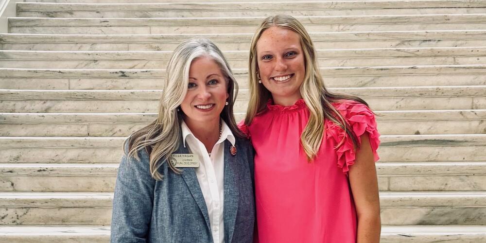 Georgia state Rep. Leesa Hagan (R-Lyons, left) with Carly Lennig of Gwinnett County, who helped create a new law to allow hunters to wear fluorescent pink hunting garments.