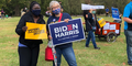Women holding Biden sign