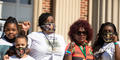 Members of Ahmaud Arbery’s family including aunts Theawanza Brooks and Carla Arbery rally outside of the Glynn County Courthouse on Oct. 16 as the trial for the three men accused in Arbery’s murder is scheduled to begin Oct. 18 in Brunswick.