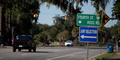 A sign directs Glynn County’s 1,000 potential jurors to Selden Park, a mass jury selection spot as the trial gets underway on Oct. 18.