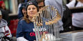 A Braves fan holds a homemade World Series Championship hat outside of Trusit Park on Nov. 5.